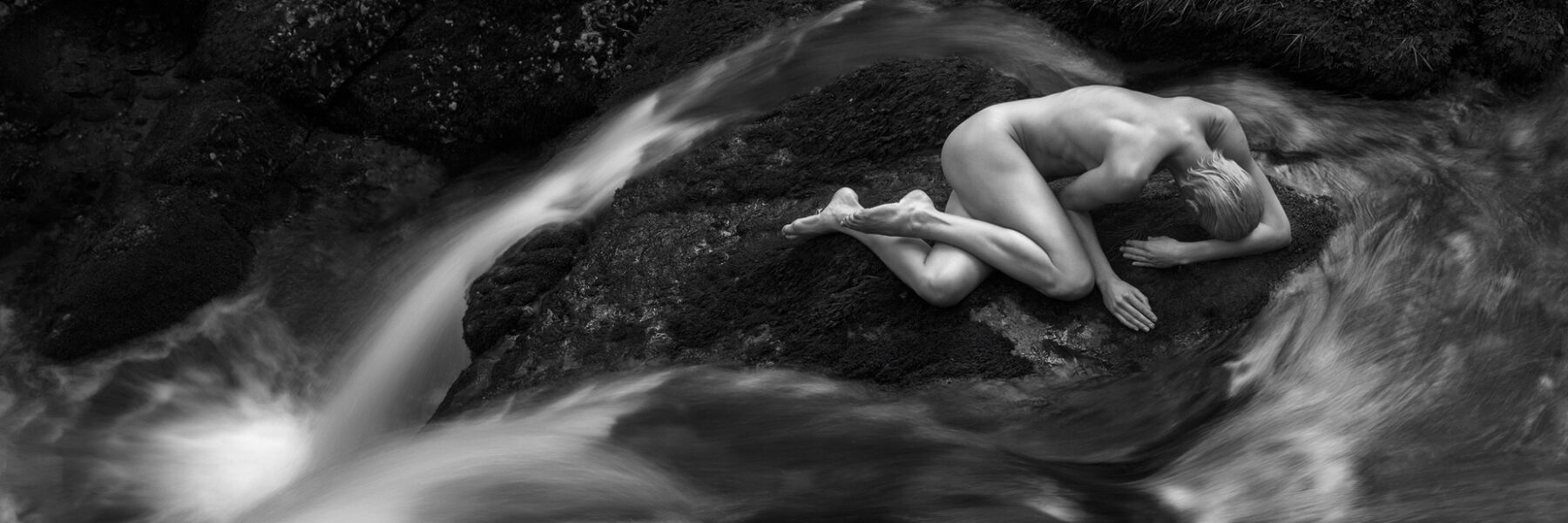 Denisa and some rushing waterfalls